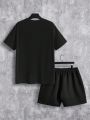 SHEIN Extended Sizes Men's Plus Size Text Pattern Short Sleeve T-shirt And Shorts Casual Fashion 2pcs/set