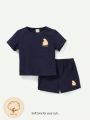 Cozy Cub Baby Boys' Cartoon Bear & Letter Print Short Sleeve Top And Casual Shorts Set