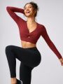 GLOWMODE FeatherFit™ Knotted Crop Tee With Thumbhole Light Support