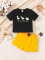 SHEIN Baby Boys' Cartoon Pattern Round Neck Short Sleeve Top And Solid Color Shorts Set