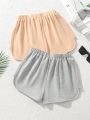 SHEIN Kids EVRYDAY Tween Girls' Loose Fit Knitted Solid Color Shorts With Smiling Face Embroidery For Spring And Summer