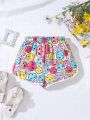 SHEIN Kids QTFun Young Girl's Emoticon Print Shorts With Curled Hem