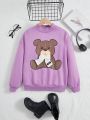 SHEIN Kids QTFun Tween Girl Bear Print Bow Patched Drop Shoulder Sweatshirt