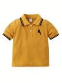 SHEIN People Riding Horses Embroidery Boys (small) Polo Shirt