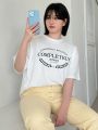 Dazy Petite Plus Women's Plus Size Letter Graphic Round Neck Short Sleeve T-shirt