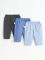 SHEIN Newborn Baby Boys' Imitation Denim Solid Color Skinny Pants Set, 3pcs