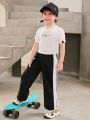 SHEIN Kids SPRTY Toddler Boys' Street Style Casual, Comfortable, Fashionable, Simple, Practical, Versatile, Contrast Side Joint Design, Split Open Hem Active Pants
