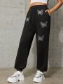 SHEIN Teens' Knitted Velvet Butterfly Printed Casual Sweatpants With Rhinestone Decoration