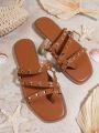 Women's Fashionable Flat Sandals With Cross Straps And Rivets Embellishment