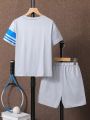 SHEIN Kids KDOMO Boys' Contrast Stripe Letter Print T-Shirt And Shorts Set