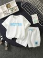 SHEIN Kids KDOMO 2pcs/Set Young Boys' Casual And Stylish Short Sleeve Top And Shorts Set With Comfortable, Simple, Versatile And Soft Loose Texture Fabric And Letter Print, Suitable For Spring And Summer