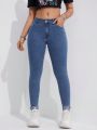 Solid Color Skinny Jeans With Slanted Pockets