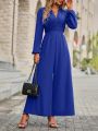 Flared Leg Jumpsuit With Puffed Sleeves And Pleated Details