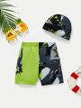 SHEIN Toddler Boys' Tight & Casual Dino Pattern Swim Trunks, Swim Cap And Swimwear Set