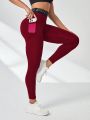 Letter Graphic Wide Waistband Contrast Mesh Insert Phone Pocket Top-stitching Sports Leggings