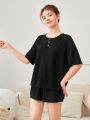 SHEIN Teen Girls' Knit Solid Round Neck Half-Placket Button Up Loose Fit T-Shirt And Shorts Pajama Set With Pockets