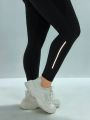 Daily&Casual Plus Size Women's Reflective Striped Yoga Leggings With Pockets, Sports Tight Pants