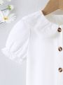 SHEIN Kids FANZEY Little Girls' Casual Irregular Embroidery Doll Collar Bubble Long Sleeve Solid Color Shirt For Summer