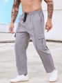 Manfinity Men Plus Flap Pocket Side Drawstring Waist Cargo Pants