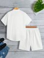 SHEIN Kids EVRYDAY Tween Boys' Casual Stand Collar Short Sleeve Shirt And Solid Woven Shorts 2pcs/Set