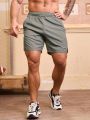 SHEIN Running Men's Solid Color Sports Shorts
