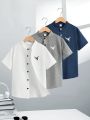 SHEIN Kids EVRYDAY 3pcs Tween Boys' Loose Fit Casual Stand Collar Woven Short Sleeve Shirt Set