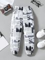 SHEIN Kids QTFun Young Boys' Newspaper Printed Long Pants