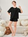 SHEIN Teen Girls' Knit Solid Round Neck Half-Placket Button Up Loose Fit T-Shirt And Shorts Pajama Set With Pockets