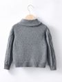 Young Boy Buttoned Cardigan Sweater