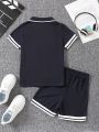 SHEIN Kids SPRTY Young Boys' Striped Collar Polo Shirt And Shorts Set