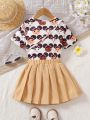 Young Girls' Cartoon Character Printed Round Neck Short Sleeve T-Shirt And Pleated Half Skirt Two Piece Set