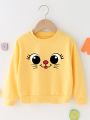 Young Girl Cartoon Graphic Pullover