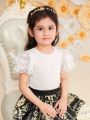 SHEIN Kids Nujoom Young Girls' Slim Fit Cute Lace Trimmed Puff Sleeve T-Shirt With Round Neckline, Ideal For Vacations