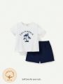 Cozy Cub Baby Boys' Coconut Tree & Letter Print Short Sleeve T-Shirt With Solid Color Shorts Set
