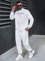 Manfinity Homme Men'S Plus Size Monogram Long-Sleeved Sweatshirt And Trousers Two-Piece Set