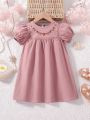 SHEIN Kids SUNSHNE Little Girls' Holiday Loose Fit Puff Sleeve Embroidery Flower Detail Woven Dress For Spring/Summer