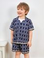 SHEIN Kids EVRYDAY Toddler Boys' Loose Fit Letter Full Printed Short Sleeve Shirt With Shorts And T-Shirt Set, Casual Outfits