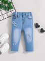 SHEIN Baby Girl Light Blue Fashionable Cute Stretchy Comfortable Y2k Flower Decorated Denim Jeans With Patch And Frayed Hem