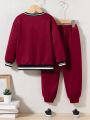 SHEIN Kids HYPEME Toddler Boys' Casual Comfortable English Pattern Sweatshirt With Ribbed Collar And Pants Set