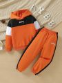 Young Boys' Casual Hooded Long Sleeve Sweatshirt With Text Print And Side Seam Patchwork Jogger Pants Set