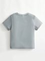 SHEIN Kids EVRYDAY 1pc Young Boy's Casual, Comfortable, Fashionable, Versatile, Playful And Cool Short Sleeve T-Shirt In Vibrant Dobby Color, Suitable For Spring And Summer