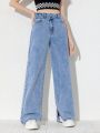 Teen Girl's New Casual Fashionable Distressed Straight Leg Jeans With Asymmetrical Button Fly And Slit Hem, In Washed Denim