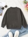 SHEIN Kids EVRYDAY Girls' Casual Round Neck Drop Shoulder Loose Fit Portrait Pattern Printed Sweatshirt For Spring And Autumn