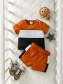 SHEIN Newborn Baby Boys' Simple Sporty Outfit, Contrast Color Round Neck Short Sleeve T-Shirt + Shorts, Casual And Comfortable For Summer
