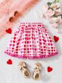 SHEIN Kids EVRYDAY Little Girls' Casual Heart Shaped Printed Skirt With Pom Pom Detail At Hem