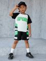 SHEIN Kids SPRTY Young Boys' Sporty Round Neck Short Sleeve T-Shirt And Shorts Set With Letter Print
