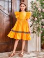 SHEIN Kids CHARMNG Tween Girl Round Neck Holiday Style Dress With Ruffle Sleeve And Weave Belt