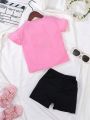 Young Girl Unicorn Pink Top And Black Shorts Set