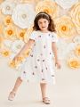 SHEIN Kids Nujoom Young Girls' Loose Fit Casual Cherry Patterned Round Neck Dress