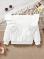 SHEIN Kids CHARMNG Young Girl Solid Color Round Neckline Loose-Fit Casual Sweatshirt With Ruffle Hem